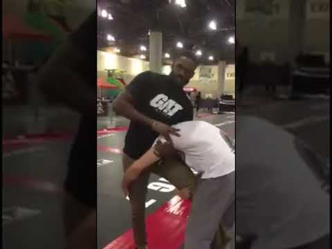 Jon Jones shows a cradle guillotine neck crank shoulder choke: \