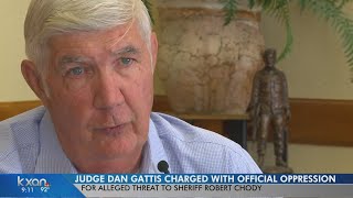 County judge charged after telling Sheriff Chody to quit tweeting