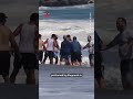 Teenage lifeguard rescues young boy from surf in Santa Cruz, California