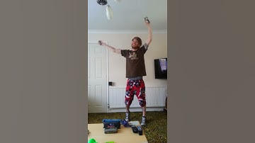First throw behind back juggling trick