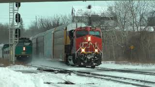 CN Train 271 Westbound Leaves VIA Train 63 Westbound in the Dust February 6, 2022