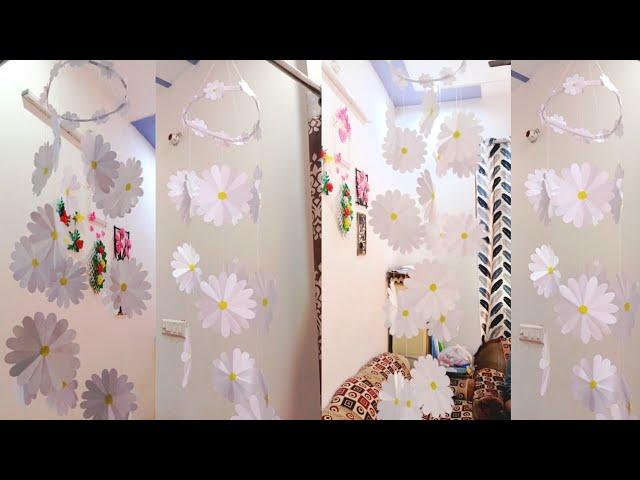 White flower paper hanging from the ceiling Stock Video Footage by  ©nalinrat #162217912