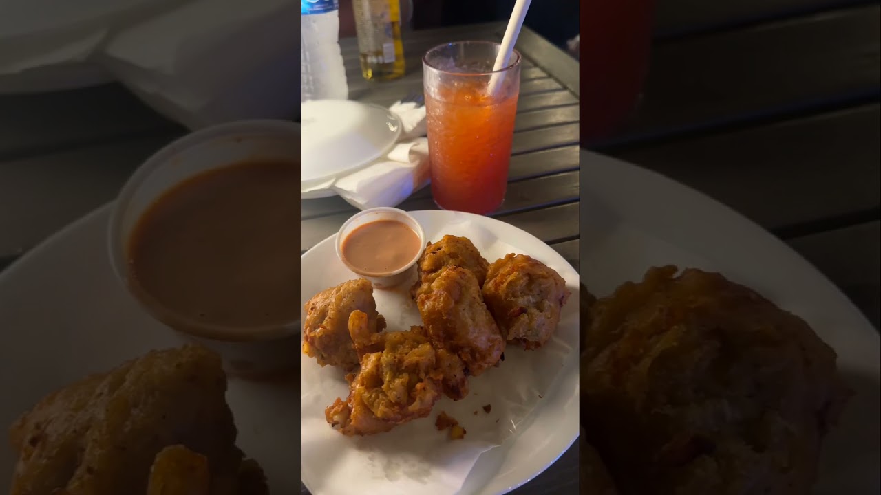 Beach dinner with live music & must-try conch fritters 