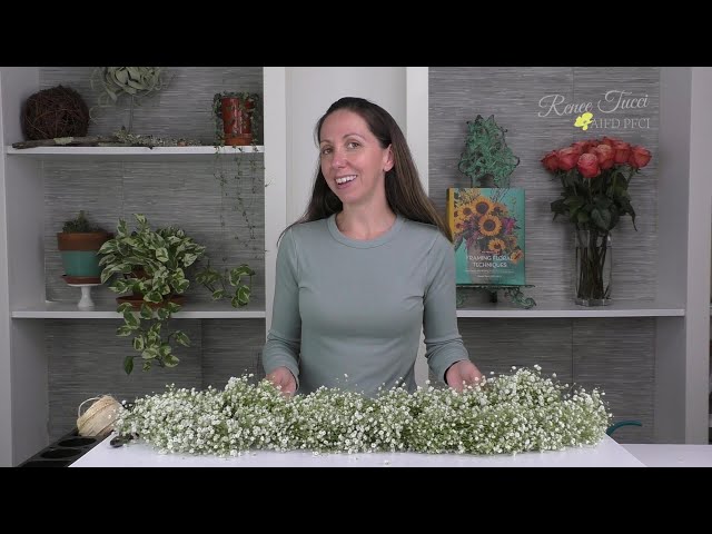 How to style a moody mantelscape with a dramatic DIY baby's breath garland