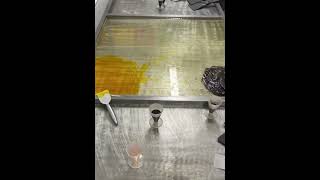 the process of mixing food coloring in candy making #shorts