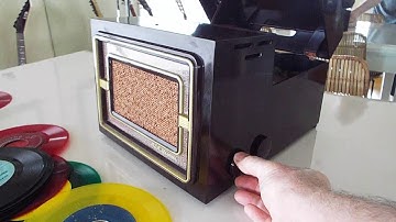 RCA 45-EY4 record player playing a stack of 45 Rpm records.