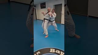 Takedown from rear clinch