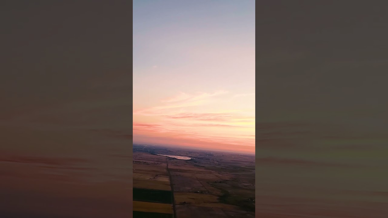 Early morning sunrise plane take off from Denver Airport 