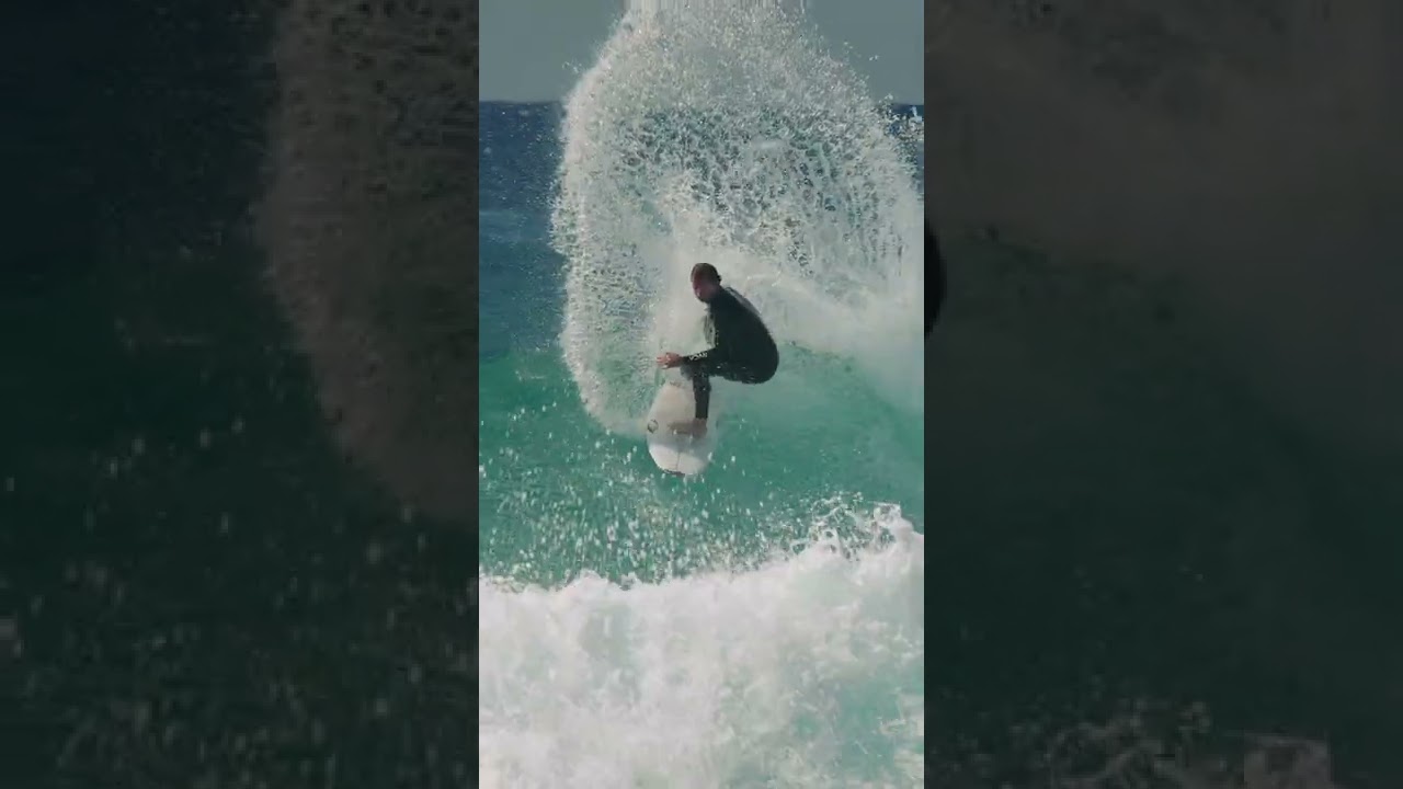 Surfer throws some serious spray. Surfing Australia. 