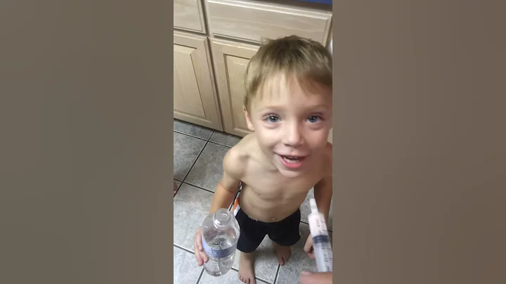 Boy stalling to take his meds..