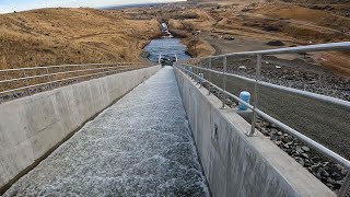 Watch a dam’s spillway in action.