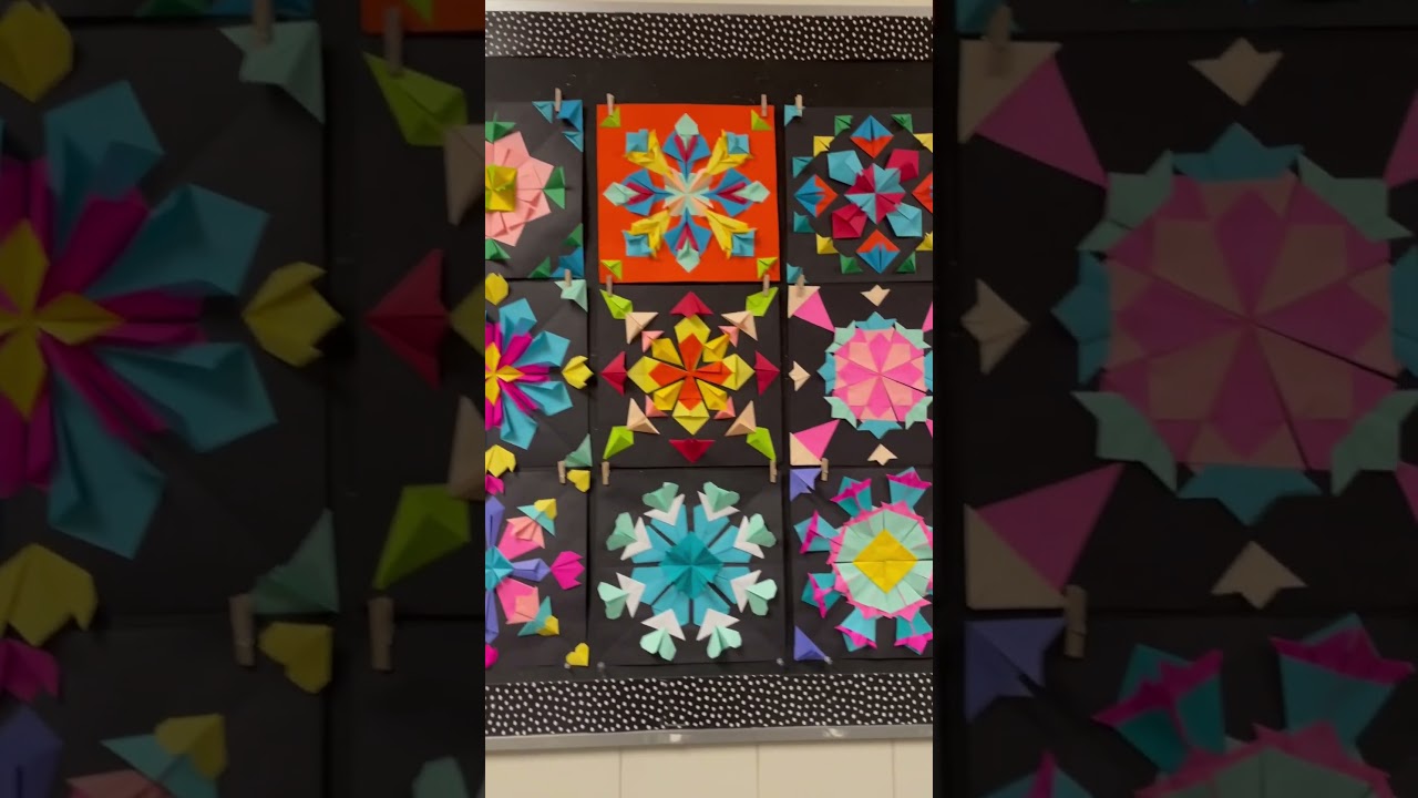 Radial relief w/ Astrobrights paper! The secret: combining folds. 