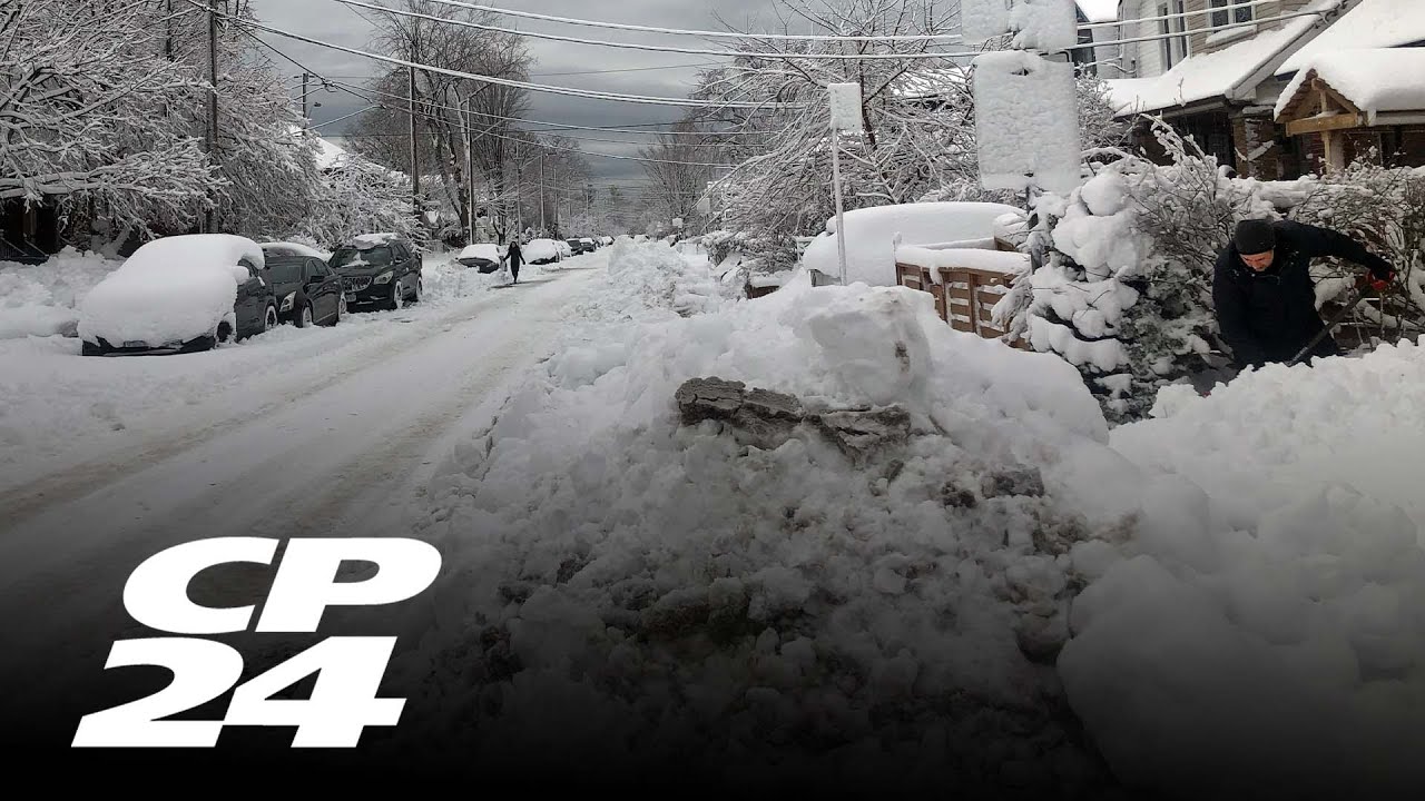 City crews continuing to remove snow from roads and sidewalks - YouTube