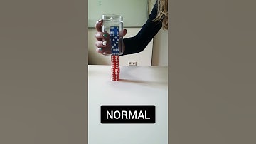 Dice Stacking in Slow Motion and Reverse