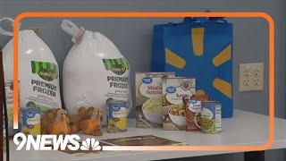 Denver Police officers pack Thanksgiving meals for people in need