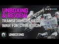 Guerra Transformers para Cybertron: Unboxing figura de cerco