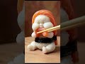 A hyper-realistic living sculpture of a chubby human infant sitting upright on a rustic wooden tble