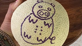 One Circle Pig Song #9 (drawing on fruit)
