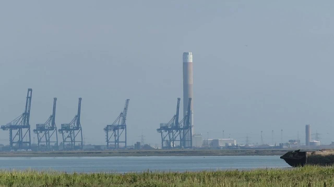 The demolition of Queenborough Power Station chimney on 7th September 2016 viewed from Motney Hill