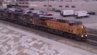 3 UP/SP AC4400's Lead a Stack/Baretable Train by the 1st Street Bridge.. 12-23-12..