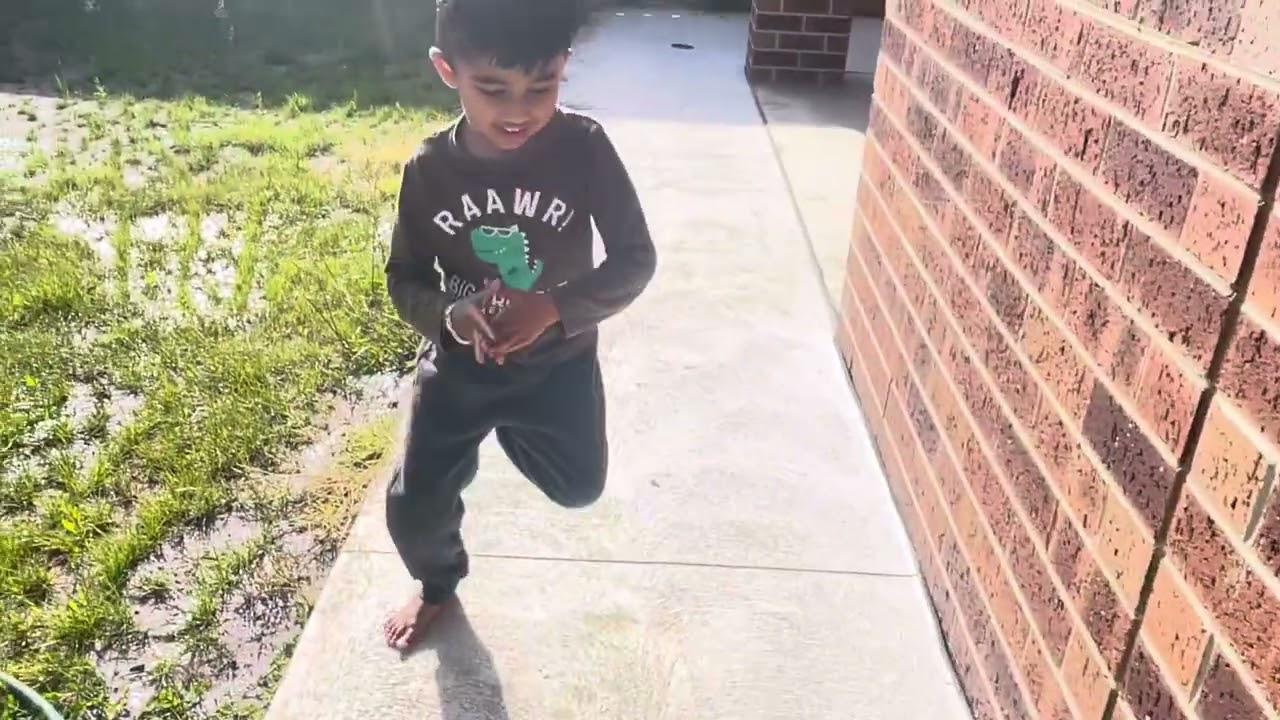 Jisha & Diyan playing with water