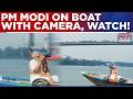 Sitting On Wooden Boat With Camera In Hand, PM Modi's 'Ganga Flows Through Soul Of Bengal' Message