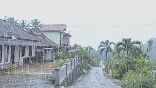 a heavy rainy day in a peaceful and quiet village l Indonesian village