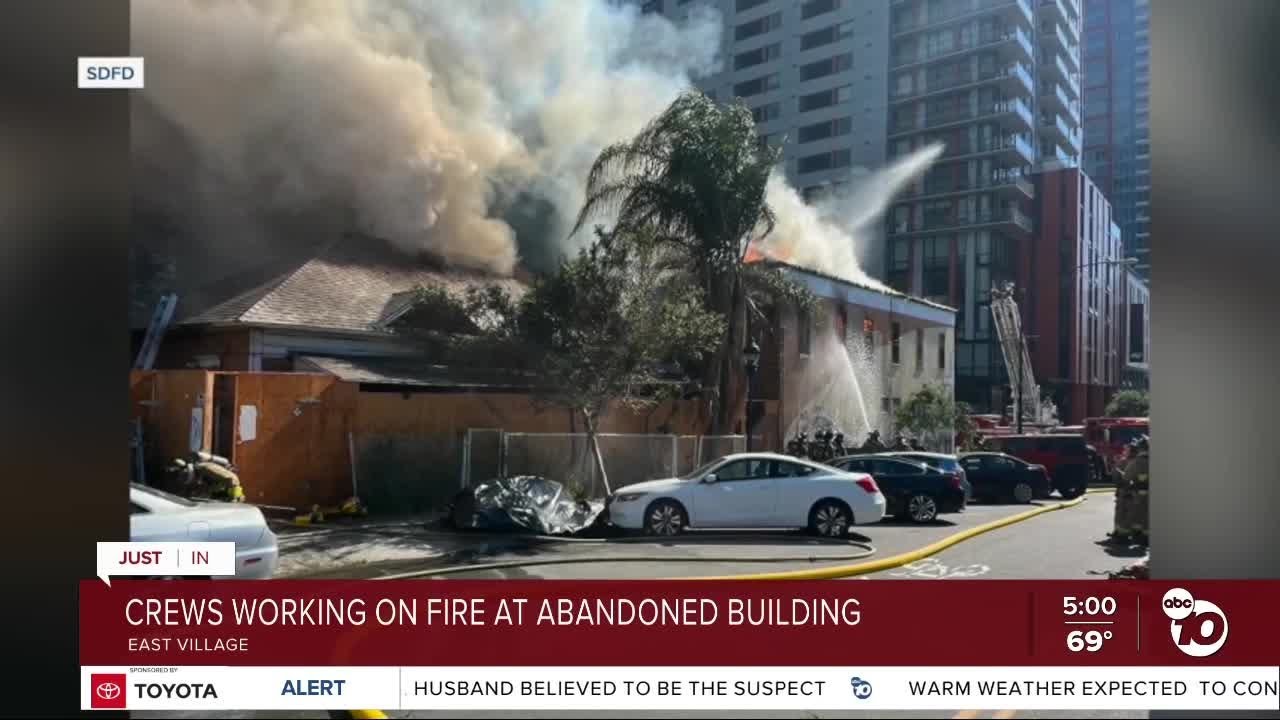 Firefighters working to put out two-alarm fire at abandoned home