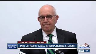 Officer charged in school incident