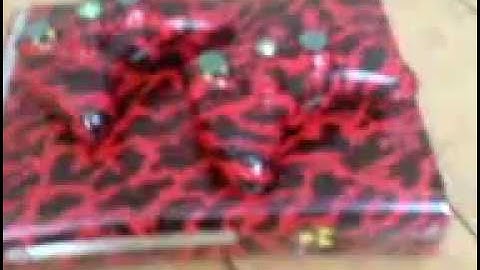 red tiger xbox  360 and controllers