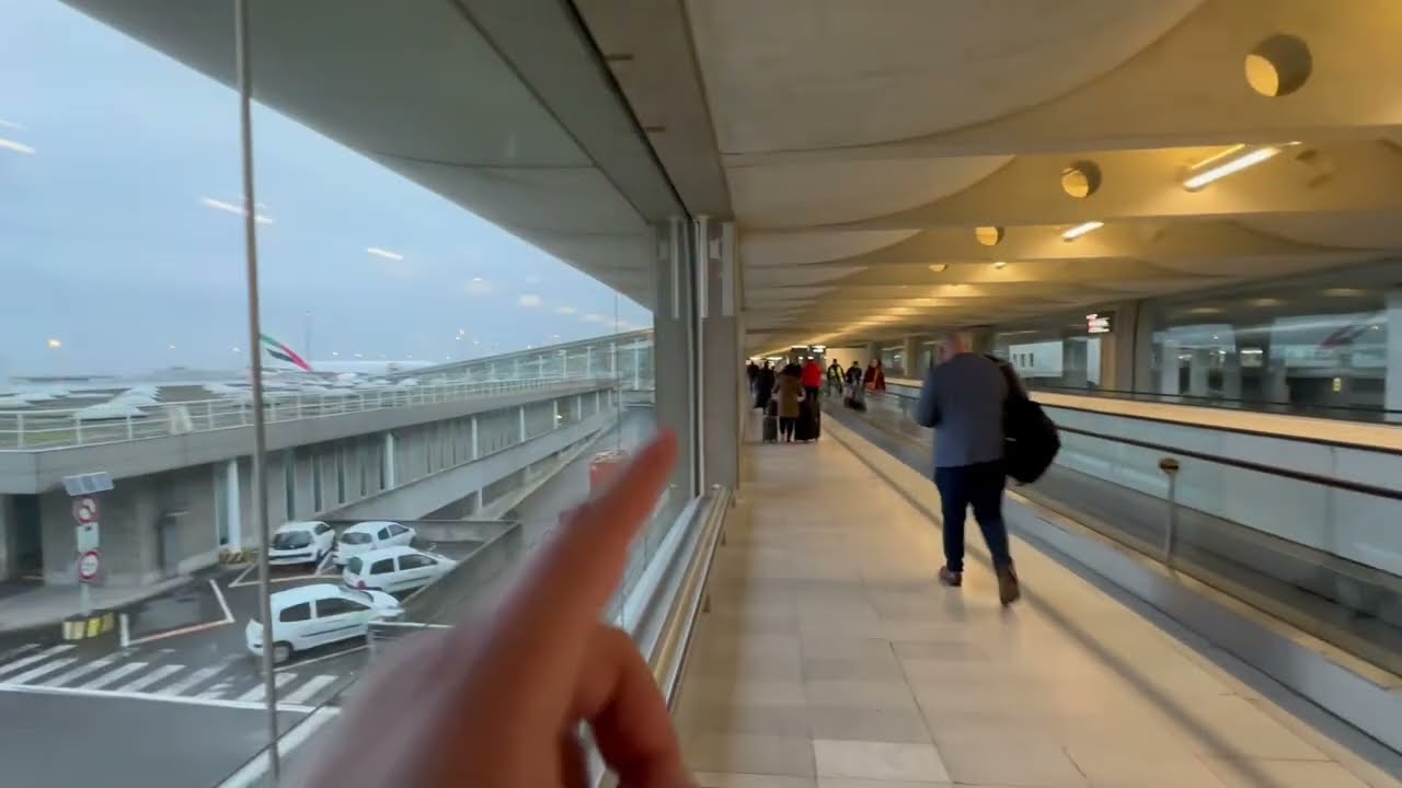 مطار تشارلز ديقول باريس من الطائرة الى محطة القطار شرح سريع