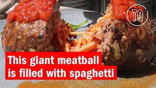 This giant meatball is filled with spaghetti
