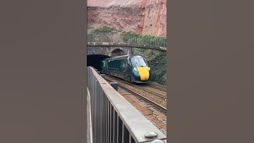 GWR class 800 exits kennaway tunnel at speed with the Penzance to Paddington service
