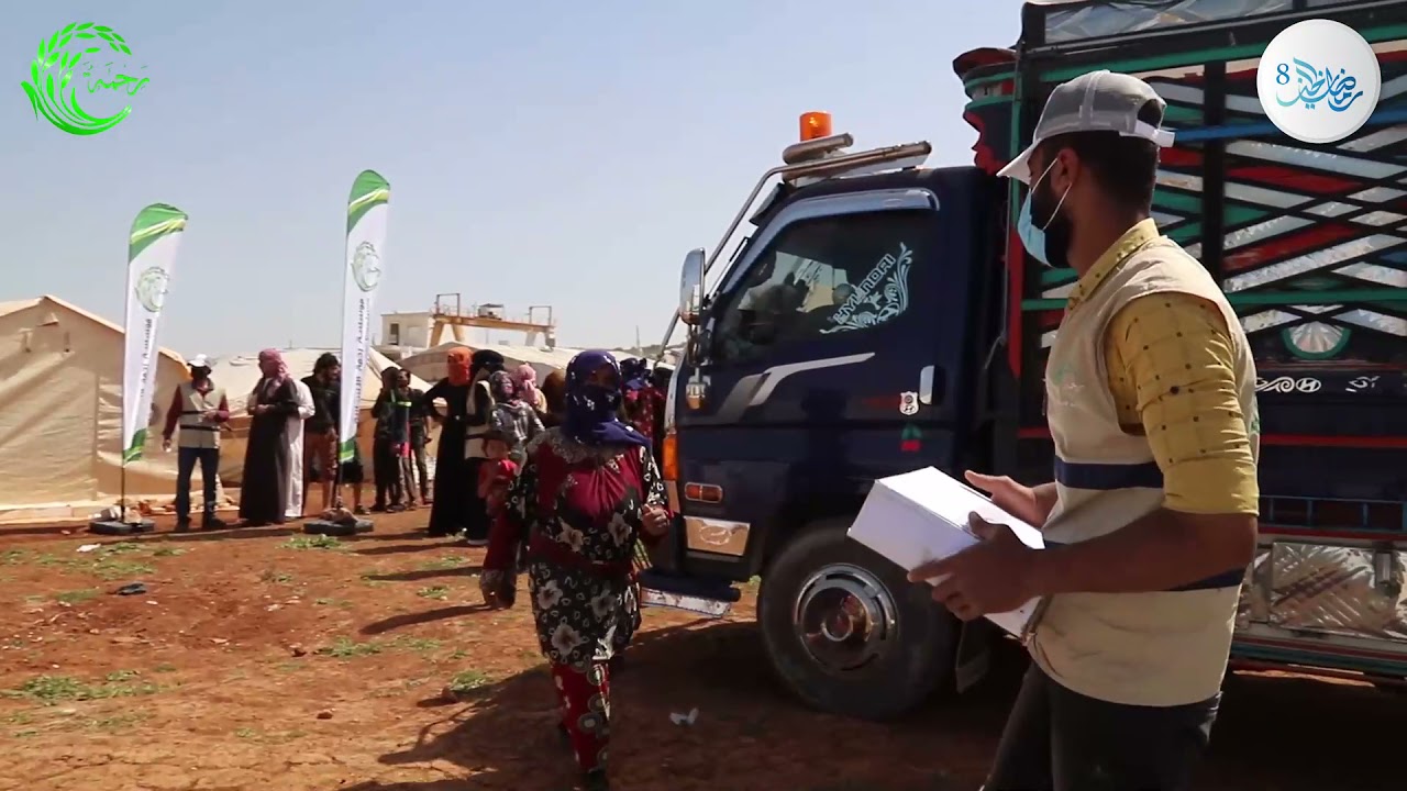 توزيع السلال الرمضانية الغذائية  على أهلنا في مخيم الوليد بلدة كفرعروق #ريف_إدلب