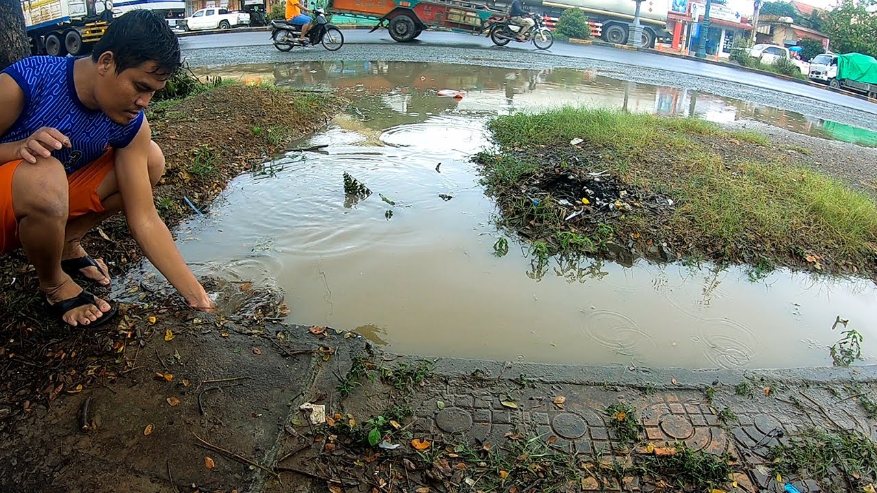 Unclogging Culvert Drain Rain Water - Remove Water On Street Road To ...
