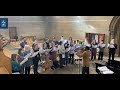 Professor david akombo and the uofg chapel choir