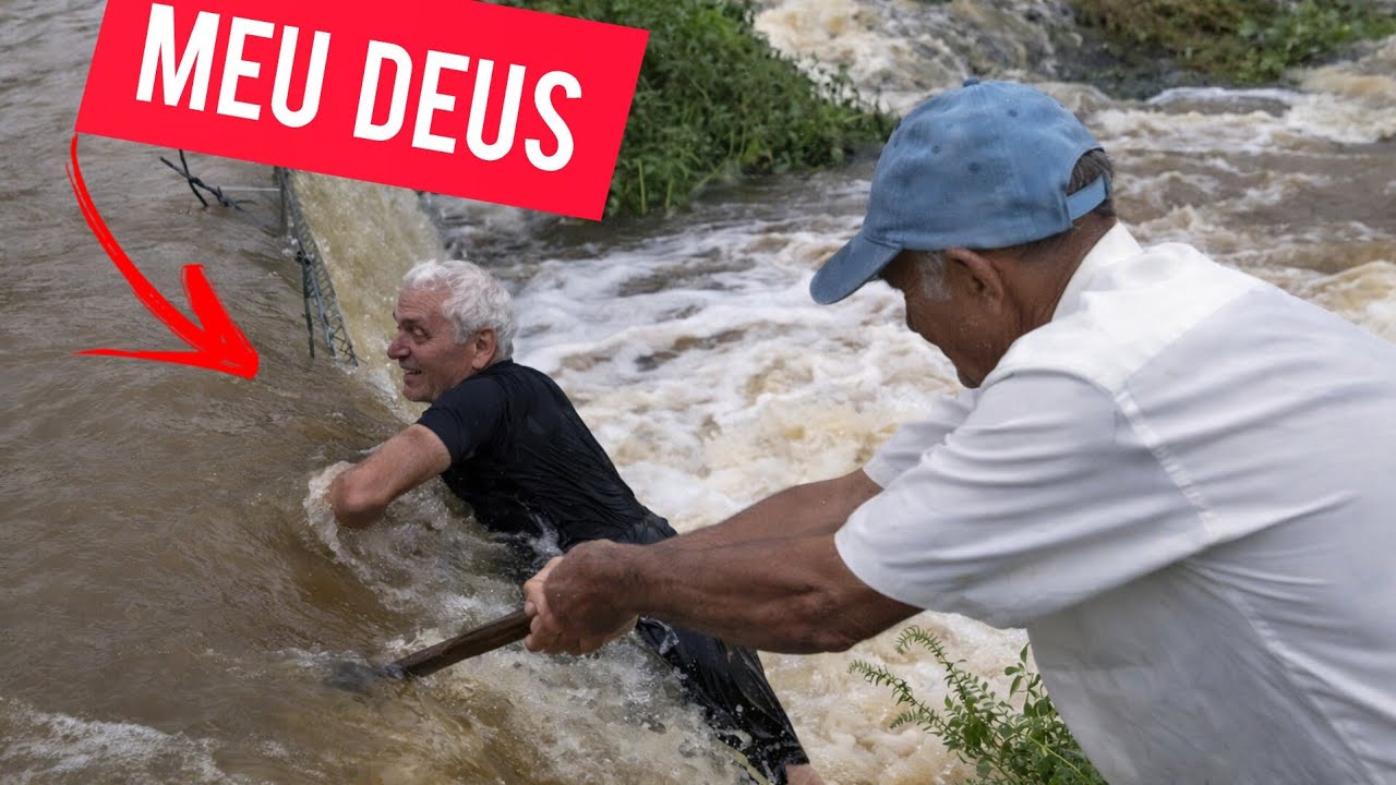 A BARRAGEM DO PAREDÃO DA LAGOA VAI ESTOURAR ARRISCADO A VIDA PARA SALVA A LAGOA OS PEIXES DESCERAM 