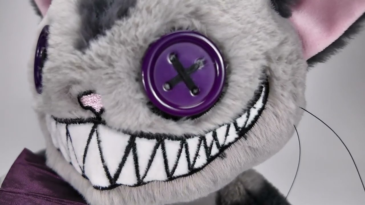 Cheshire Cat and White Rabbit from the Victorian McGee Collection