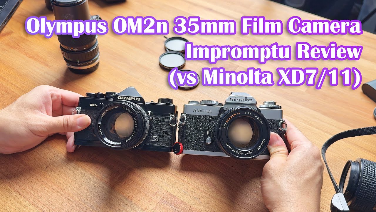 MINOLTASRT101とOLYMPUSのカメラです。 Olympus OM-1 vs Minolta SRT
