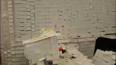 Office Covered in Post-it Notes