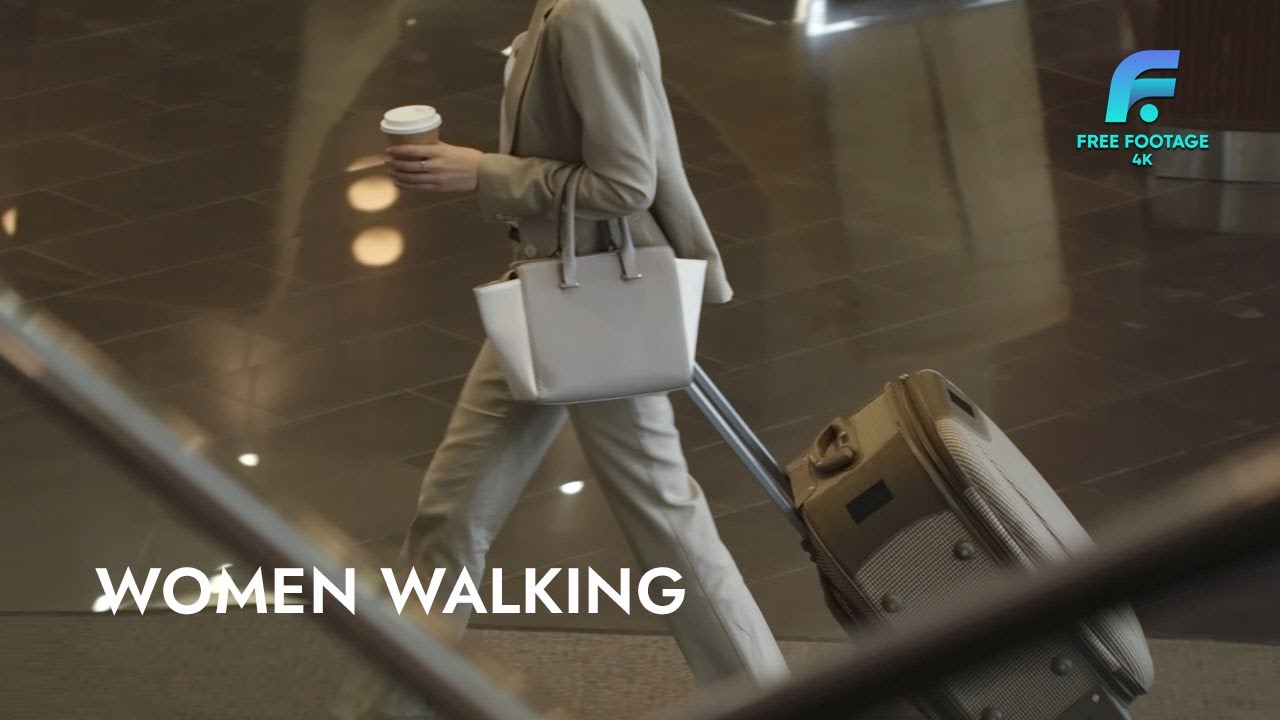 business woman walking in hotel | 4K Footage