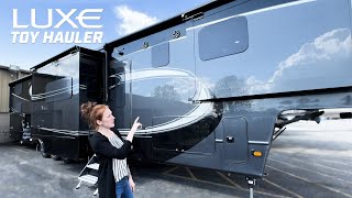 Beautiful Luxe Toy Hauler with Custom Bunks in the Garage