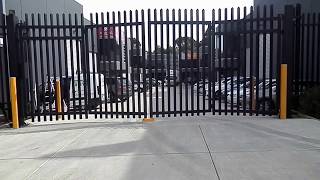 Gated Retail Complex - Commercial Security Bi-Fold Gates - by The Motorised Gate Company