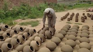 Pottery Make | throwing a spherical shaped pottery vase on the wheel | handmade skills