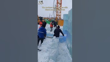 The workers cut ice cubes with diesel saws and shovels