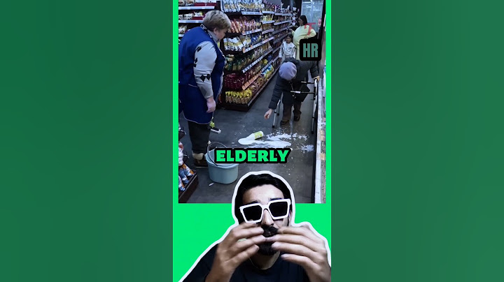 Elderly woman accidentally breaks milk bottle in store