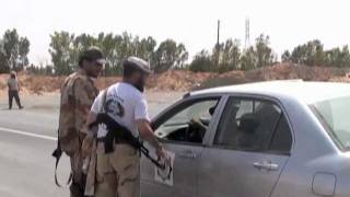 Libya's NTC Fighters Pause in Battle for Key Town
