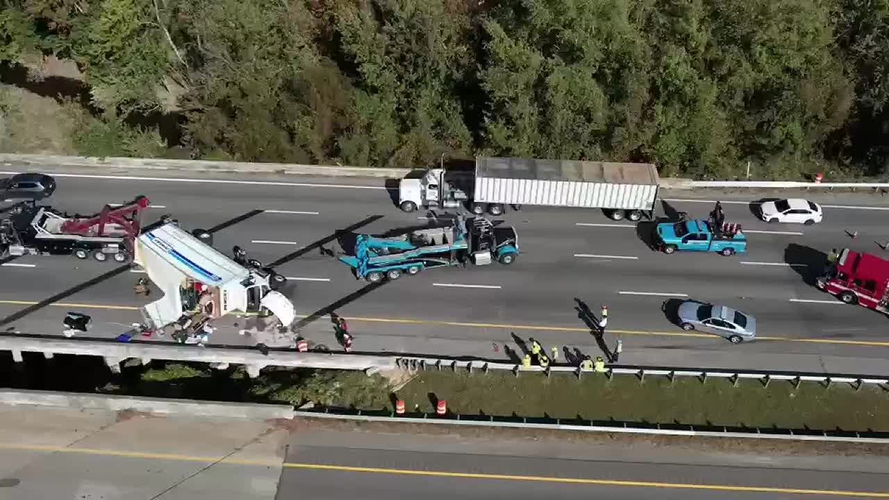 Truck overturns on I-77 southbound, 2 lanes closed - YouTube
