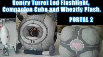 Portal 2: Sentry Turret Led Flashlight, Companion Cube and Space Core Plush.