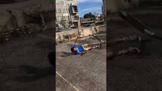 Guy on electric scooter jump from ledge and hits head on ground